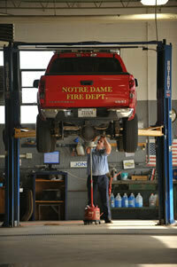 Adam Tirotta servicing a NDFD fire truck